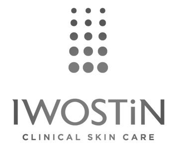 Logotyp IWOSTIN: przedstawia pionowe rzędy kropek nad napisem "IWOSTiN, Clinical Skin Care" na białym tle.