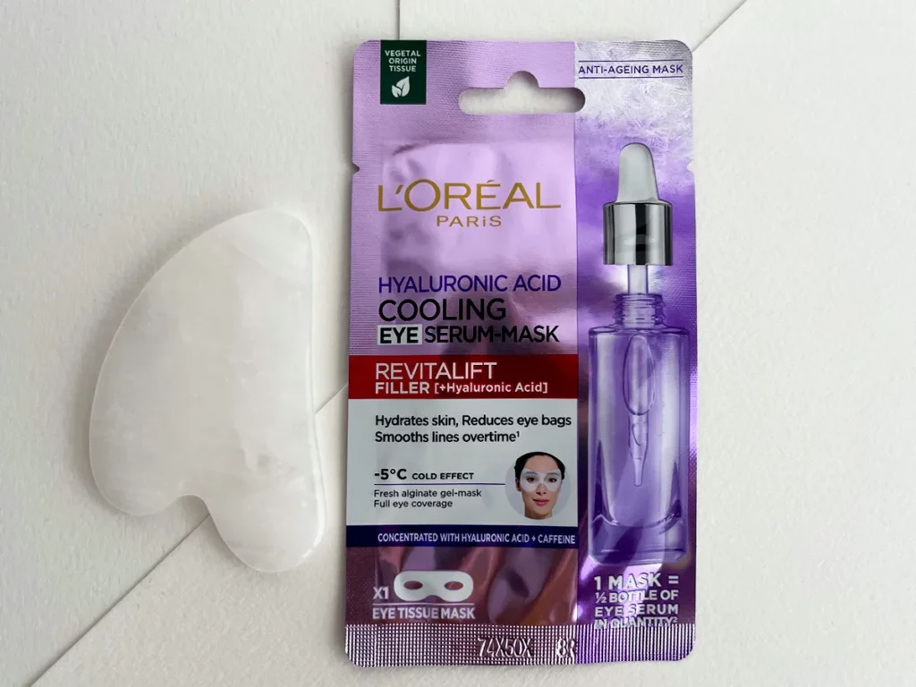 L’Oreal Paris Revitalift Filler maseczka w płachcie do oczu na białym tle z białym kamieniem guasha - tytułowa