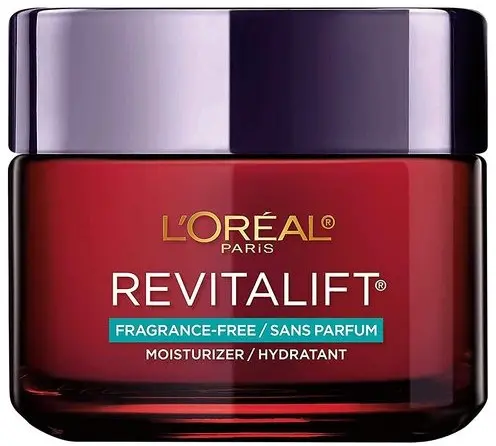 Czerwono‑fioletowy słoik kremu L'Oréal Revitalift oznaczony „bezzapachowy”, stoi na jasnym tle.