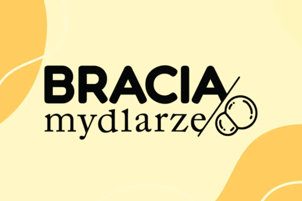 Logo "BRACIA mydlarze" z rysunkiem baniek mydlanych, umieszczone na jasnym żółto‑kremowym tle.